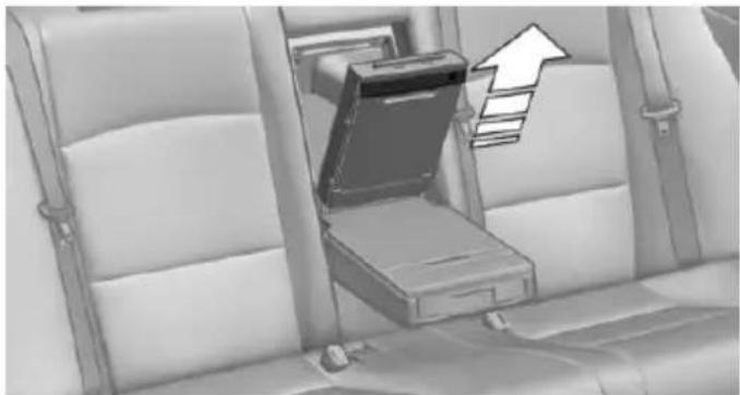 Interior view of a car seat with a laptop and upward arrow symbol (no text or labels)