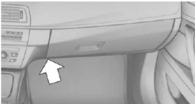 Interior view of a car dashboard with directional arrows indicating left and right sides (no text or symbols)