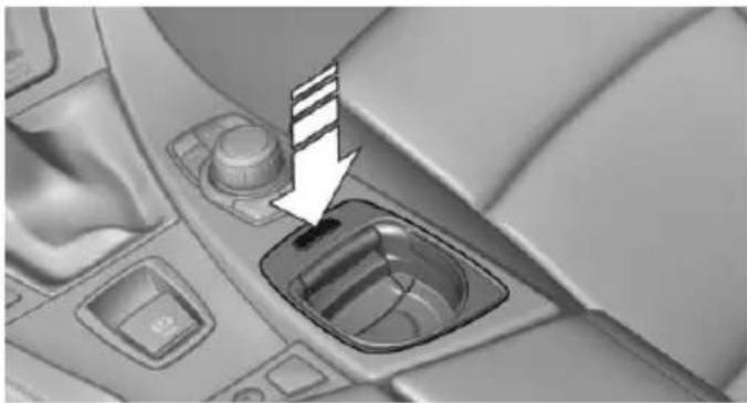 Interior view of a car dashboard with a highlighted intake component (no text or symbols visible)