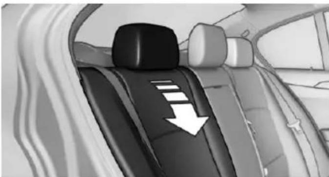 Interior view of a car showing a black seat with white stripes and a white downward arrow indicating direction (no text or symbols)