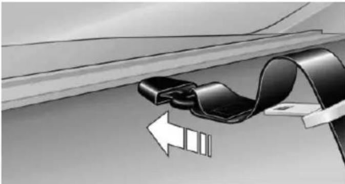 Diagram of a car seatbelt buckle being lifted by an arrow, showing mechanical components (no text or symbols)