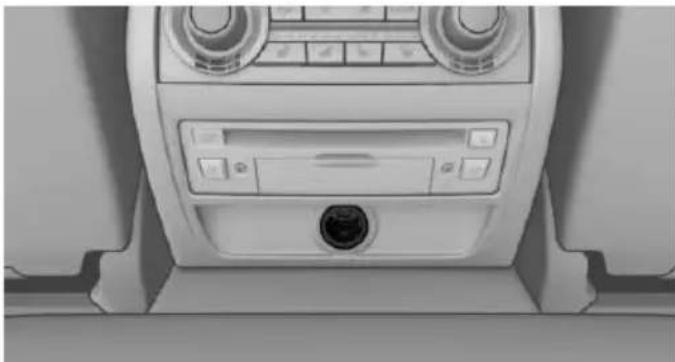 Interior view of a car dashboard with air filters and a central control panel (no visible text or symbols)