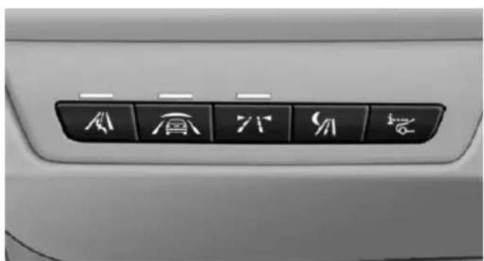 Close-up of a car's front panel with six directional icons (arrow, elephant, down, down, up, down) on the right side (no text or symbols beyond icons)