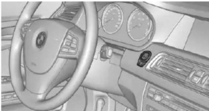 Interior view of a car dashboard and steering wheel (no visible text or symbols)