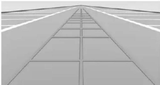 Exterior view of a modern building facade with diagonal grid pattern (no text or symbols)