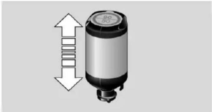 Diagram of a cylindrical device with a top cap and side arrows indicating vertical alignment (no text or symbols)