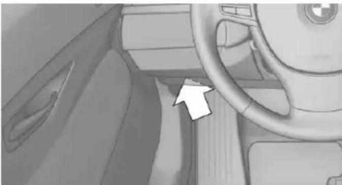 Interior view of a car dashboard and steering wheel (no visible text or symbols)