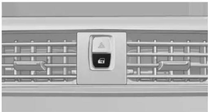 Front view of a car air conditioner grille with a central logo (no text or symbols visible)