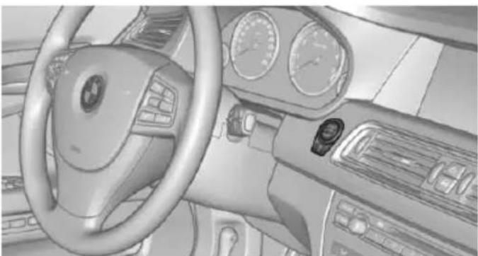 Interior view of a car dashboard and steering wheel (no visible text or symbols)