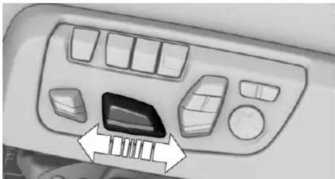 Interior view of a car dashboard with control panels and directional arrows indicating movement or flow (no text or symbols)