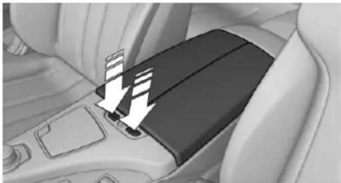Interior view of a car seatbelt with arrows indicating loading or movement (no text or symbols)
