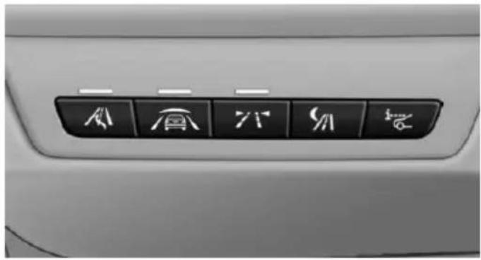 Close-up of a car's front panel with six directional icons (arrow, crown, down, back, up, etc.) on the right side (no text or symbols beyond icons)