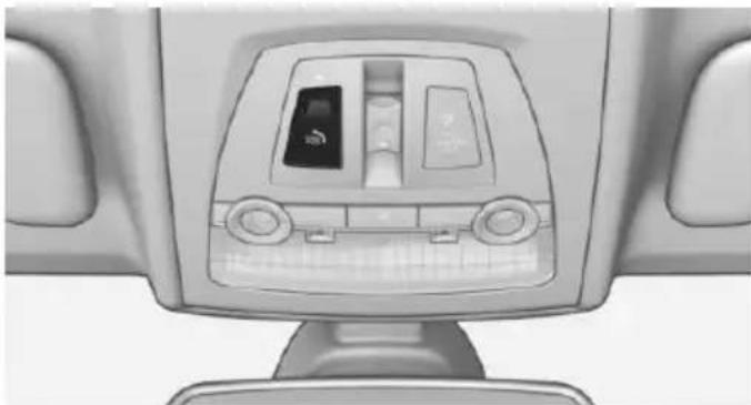 Top-down view of a car headrest with control panel and side buttons (no text or symbols visible)