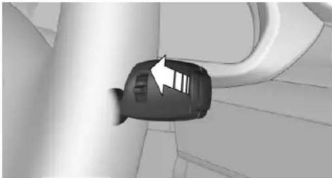 Close-up of a jet engine component with a white arrow pointing to the side panel (no text or symbols visible)