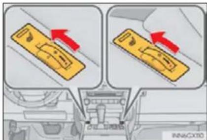 Diagram showing car interior control with directional arrows and a vehicle head inset, labeled 'INNACX10'