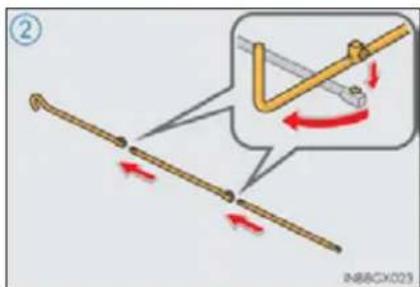 Diagram illustrating a mechanical or electrical setup with labeled components and directional arrows, including a magnified inset showing motion.