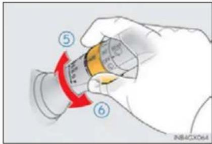 Diagram showing a hand holding a cylindrical device with numbered parts and a red curved arrow indicating rotation or adjustment.