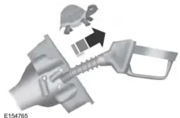 Mechanical component diagram showing a gun, turtle, and gear assembly (no text or symbols)