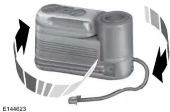 Illustration of a portable air conditioner unit with coiled cable and ventilation slots (no text or symbols)