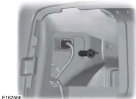 Close-up of a mechanical component with a plug inserted into a housing (no visible text or symbols)