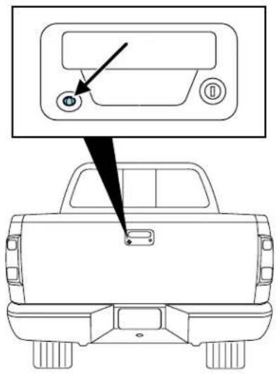 Diagram showing a vehicle front view with a control panel and a pointing button, likely illustrating dashboard or navigation instructions.