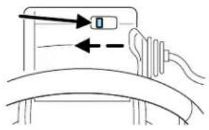 Illustration of a hand adjusting a device on a curved surface, with no visible text or symbols