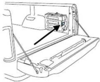 Line drawing of a vehicle interior showing a component with an arrow pointing to a housing (no text or symbols present)