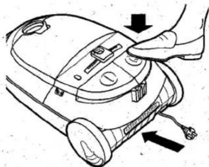 Diagram showing a hand adjusting the internal components of a vacuum cleaner with labeled parts and directional arrows indicating assembly or repair.