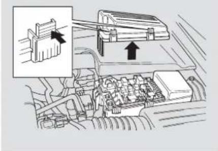 Diagram showing engine compartment with labeled parts and directional arrows indicating movement or flow