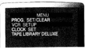 MENU PROG. SET/CLEAR VCR SETUP CLOCK SET TAPE LIBRARY DELUXE