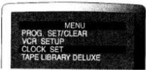 MENU PROG. SET/CLEAR VCR SETUP CLOCK SET TAPE LIBRARY DELUXE