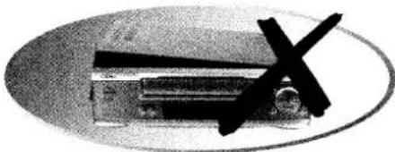 Black-and-white image showing a vehicle with a large 'X' symbol and a cross mark, enclosed in an oval frame.
