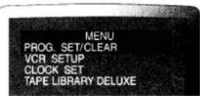 MENU PROG. SET/CLEAR VCR SETUP CLOCK SET TAPE LIBRARY DELUXE