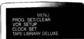 MENU PROG. SET/CLEAR VCR SETUP CLOCK SET TAPE LIBRARY DELUXE