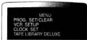 MENU PROG. SET/CLEAR VCR SETUP CLOCK SET TAPE LIBRARY DELUXE