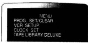MENU PROG. SET/CLEAR VCR SETUP CLOCK SET TAPE LIBRARY DELUXE