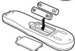 Line drawing of a remote control device with battery and socket components (no text or symbols)