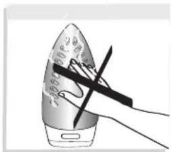 Illustration of a hand using a power tool to cut a steamer (no text or symbols visible)