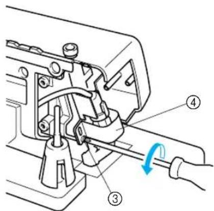 Technical diagram of a mechanical assembly with numbered components and a blue circular arrow indicating rotation or adjustment.