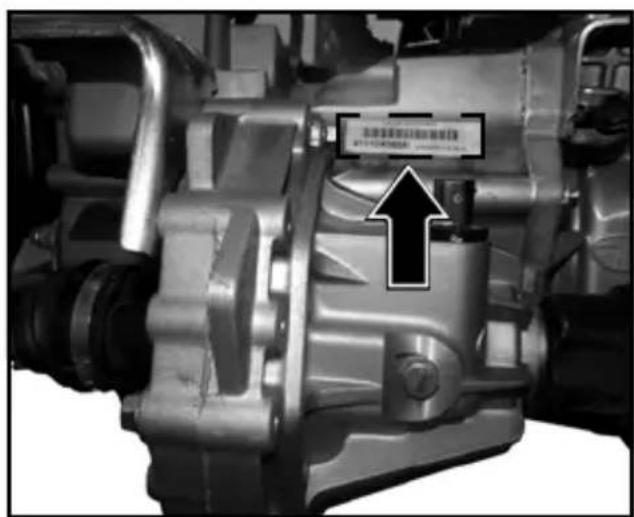 Close-up of a mechanical assembly with an arrow pointing to a component labeled in Chinese.