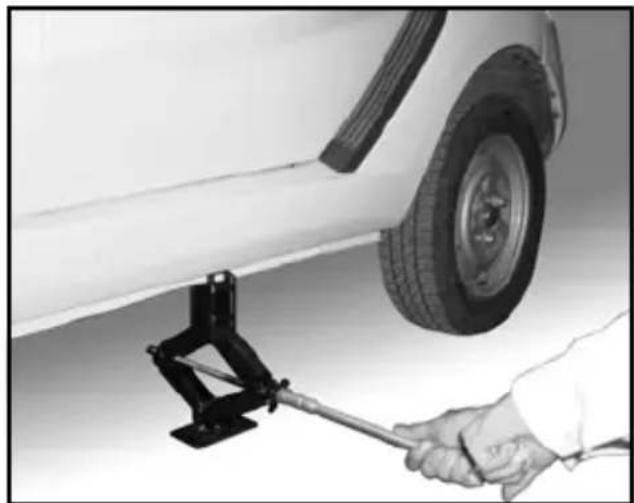 Tata Nano - Changing the flat tyre - 3