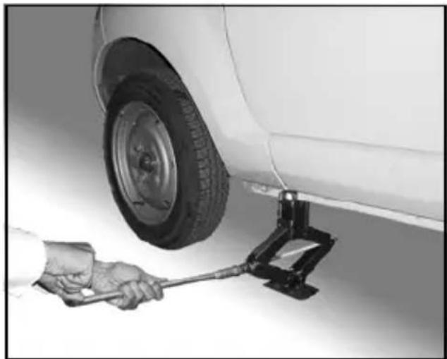Tata Nano - Changing the flat tyre - 2