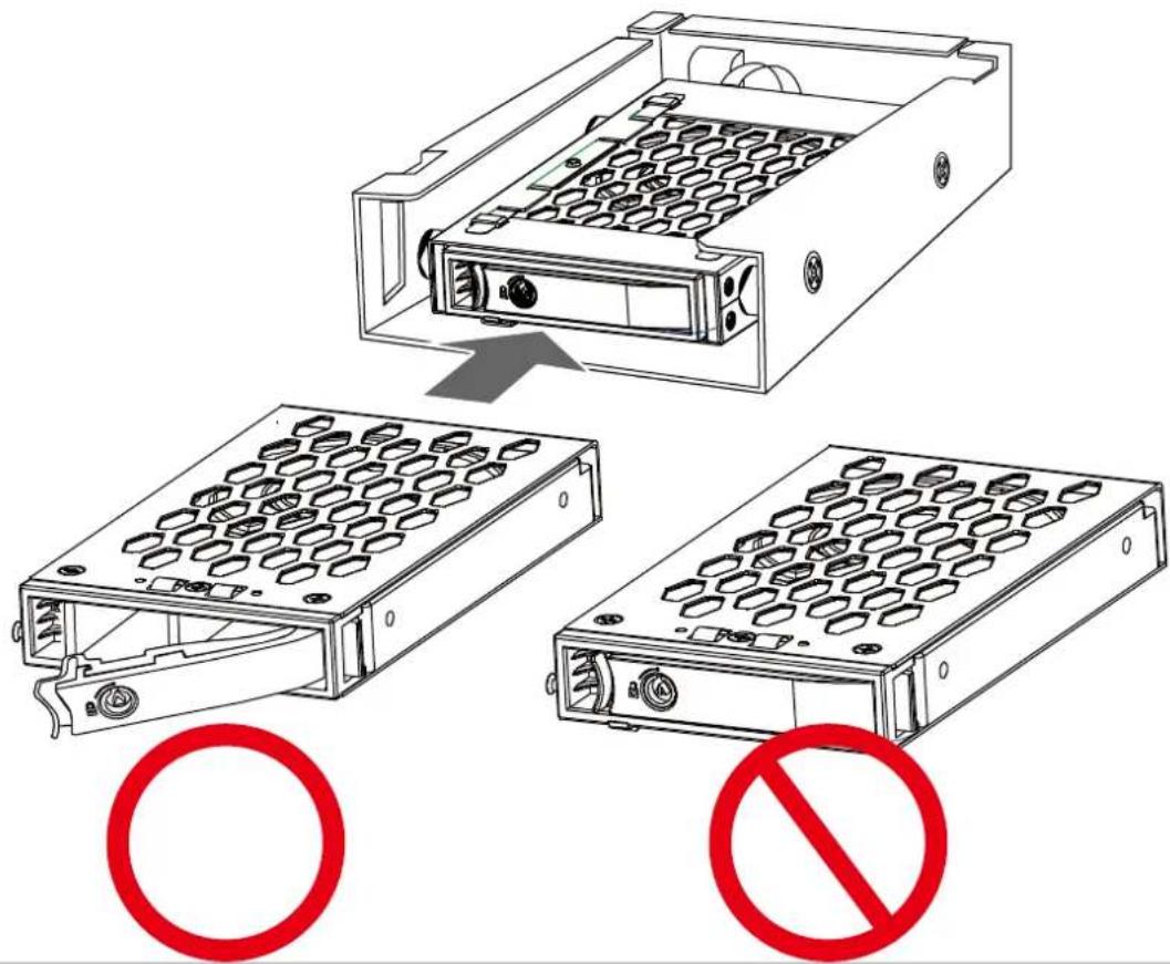 Diagram showing three views of a computer drive with labeled components and prohibition signs