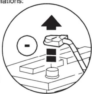 Diagram showing a mechanical or electrical component with an upward arrow and a circle, possibly indicating direction or force.