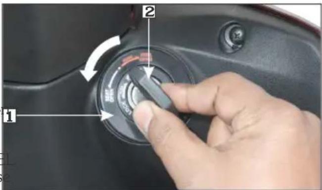 Close-up of a car air conditioner's rotary dial with labeled buttons and adjustment arrows