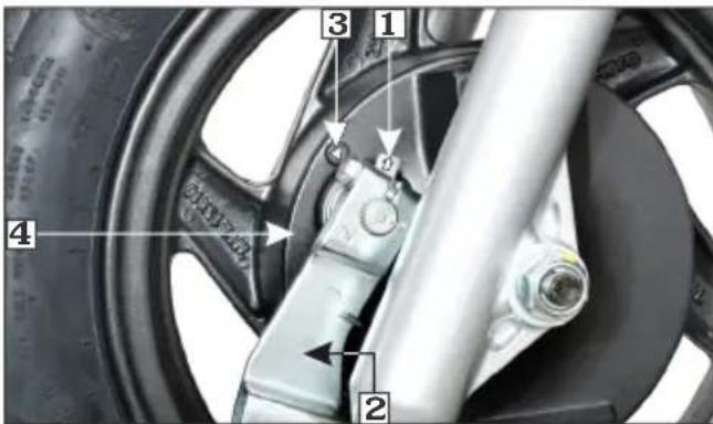 Technical diagram of a car wheel and brake system with numbered components and directional arrows indicating assembly or movement.