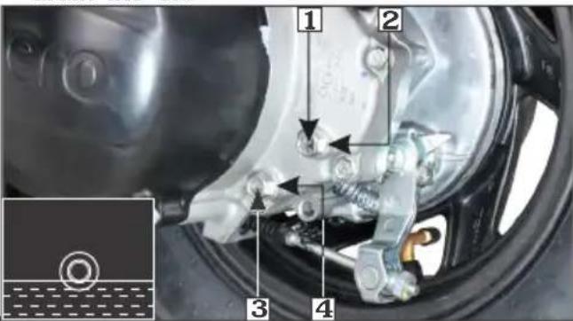 Technical diagram of a car brake system with numbered components and an inset close-up view
