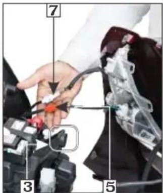 Diagram showing a hand connecting components labeled 3, 5, and 7 to a device with wires and connectors.