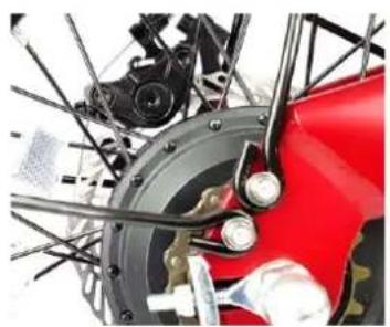 Close-up of a red bicycle wheel assembly with visible springs and components (no text or symbols)