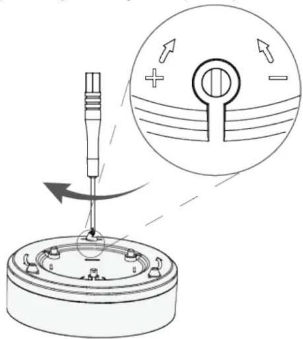Diagram illustrating a mechanical or electrical device with directional arrows and a magnified circular view showing internal flow or signal flow.
